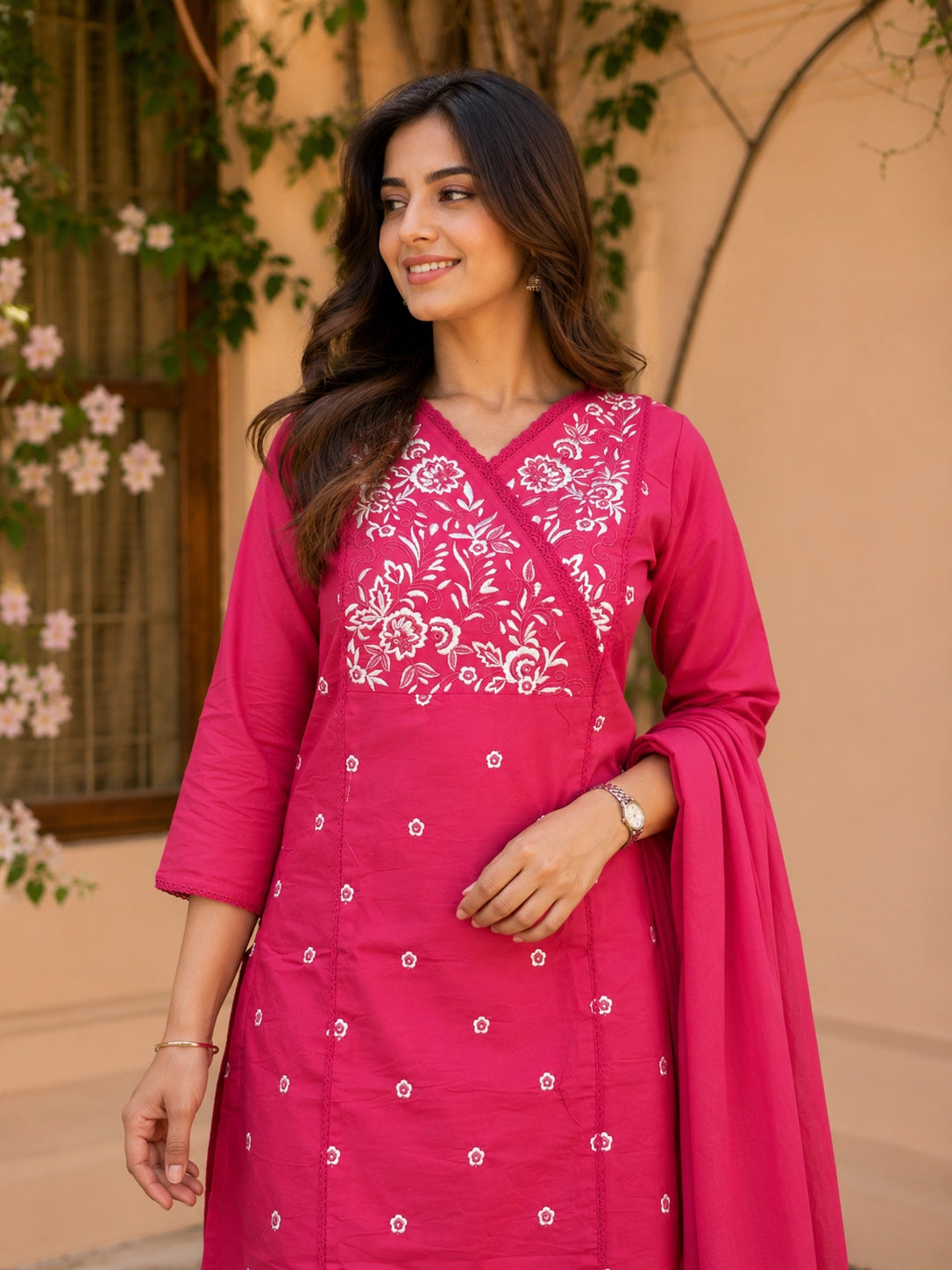 Pink V-neck embroidered kurta with matching pants and dupatta
